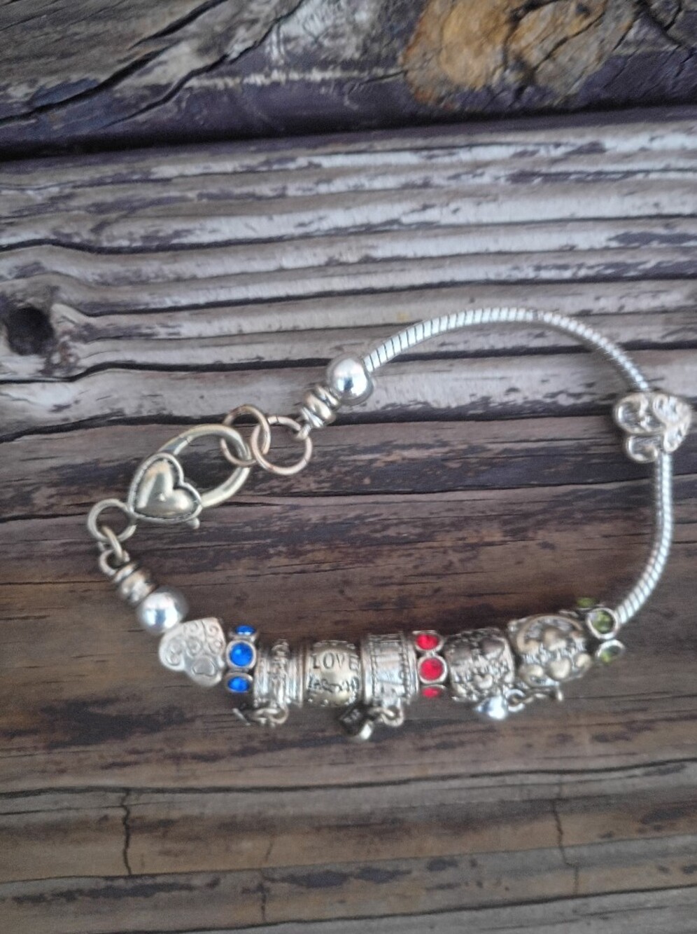 Silver Heart Charm Bracelet with Blue Accents
